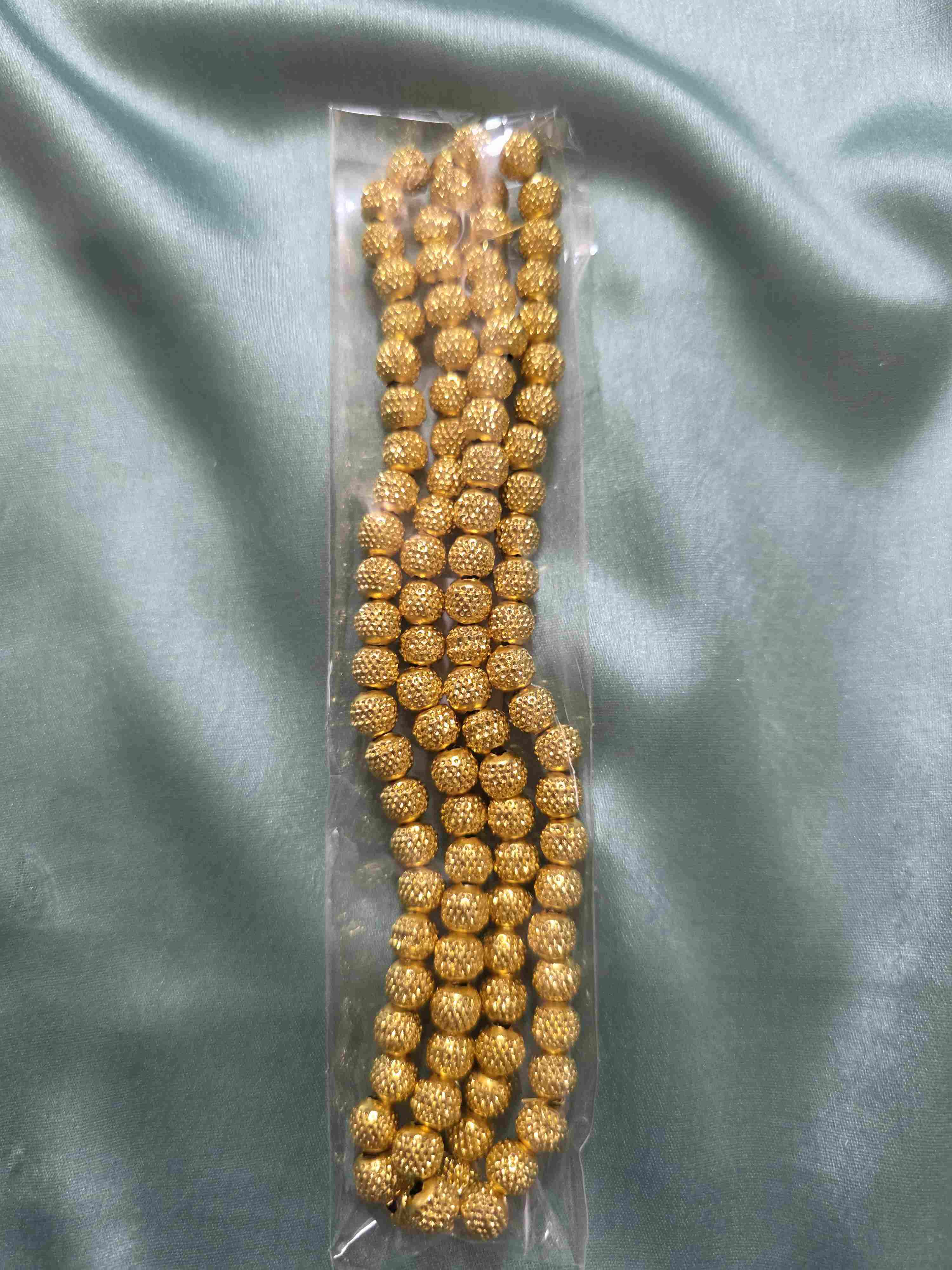 Dotted Golden bead 8mm 